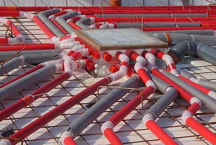 The Legalett Heated Floor System is a network of pipes from a furnace box that is case in the slab